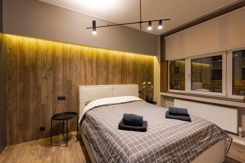 Ένα ή περισσότερα κρεβάτια σε δωμάτιο στο Marias Apartment