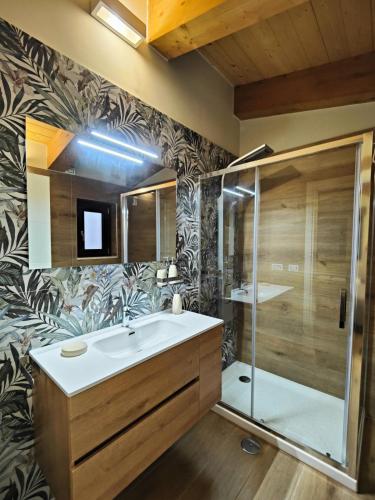 a bathroom with a sink and a shower at B&B Casa MariLù in Fuscaldo