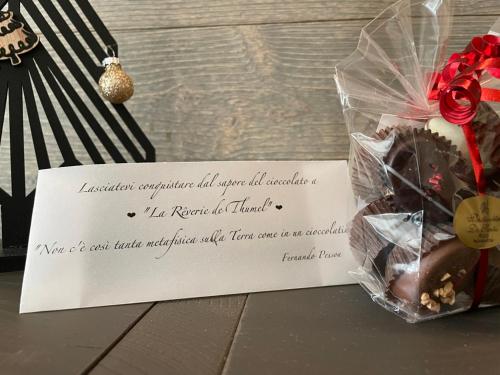 a piece of paper with a box of donuts at LA RÊVERIE DE THUMEL - CHAMBRES in Rhêmes-Notre-Dame