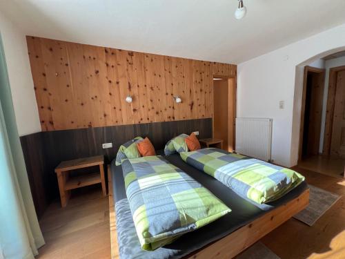 Postel nebo postele na pokoji v ubytování Ferienwohnungen Unterfeld