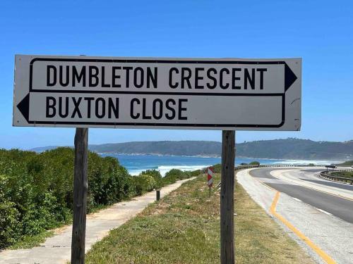a street sign on the side of a road at Wilderness deckhouse. views!/sun/sea/river/kayaks in Wilderness