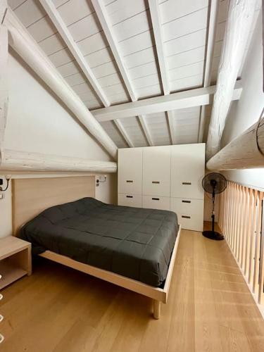 Tempat tidur dalam kamar di Residenza Frattini