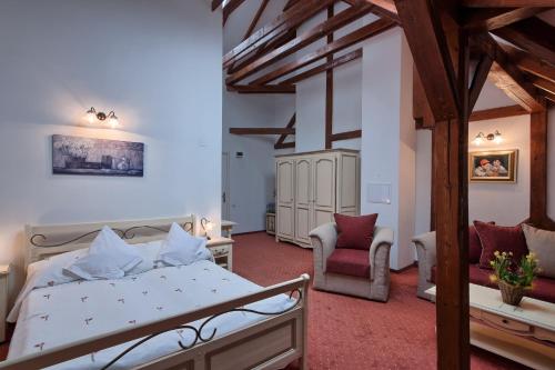 Ένα ή περισσότερα κρεβάτια σε δωμάτιο στο Hotel Traube