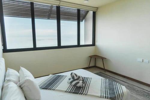 Katil atau katil-katil dalam bilik di Breathtaking Ocean Vista Penthouse in Holbox at Yumbalam