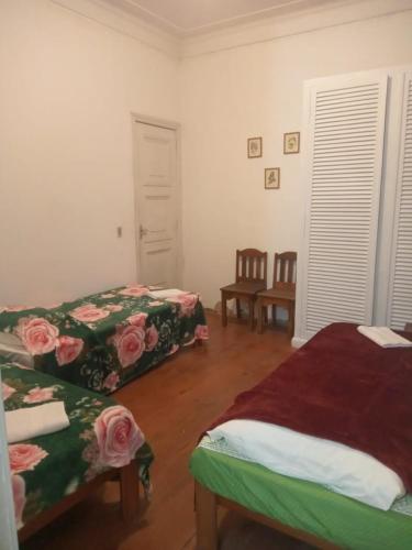 Ein Bett oder Betten in einem Zimmer der Unterkunft Pousada Inaya