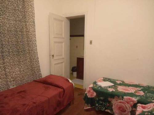 Ein Bett oder Betten in einem Zimmer der Unterkunft Pousada Inaya