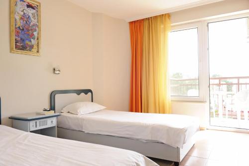 Hotel Iskar & Aquapark - All Inclusiveにあるベッド