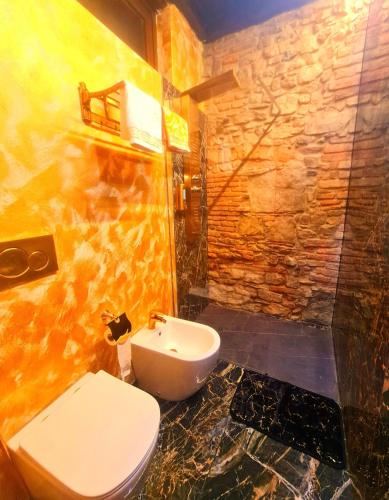 Un baño de SUITE CARAVAGGIO