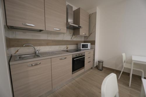 Η κουζίνα ή μικρή κουζίνα στο B&B Nonna Maria