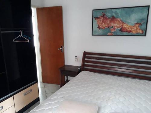 Cama o camas de una habitación en Apartamento na Avenida Atlântica