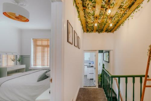 Ένα ή περισσότερα κρεβάτια σε δωμάτιο στο Central Retreat