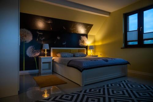 Postel nebo postele na pokoji v ubytování GOLD apartamenty & spa