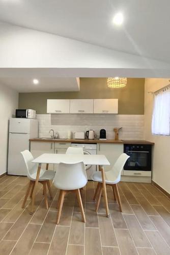 Appartement au cœur du village, climatisé avec extérieur