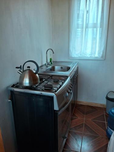 Kuchyň nebo kuchyňský kout v ubytování Cabaña ecológica