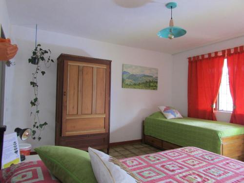 Postel nebo postele na pokoji v ubytování Alojamiento Rural Jardín Consentido