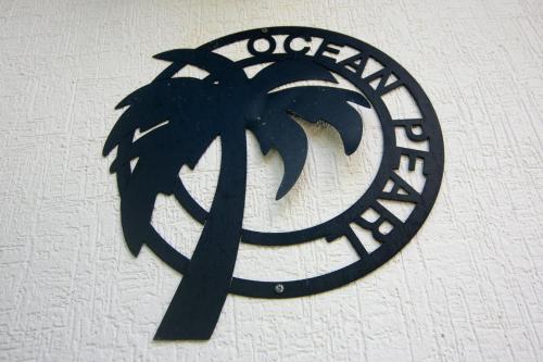 Πιστοποιητικό, βραβείο, πινακίδα ή έγγραφο που προβάλλεται στο Ocean Pearl home