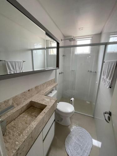 Et badeværelse på Apartamento em Itapema Vista mar e ar