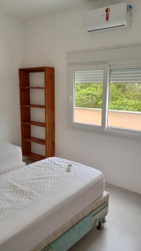 Postel nebo postele na pokoji v ubytování Casa c/ SPA e mesa de sinuca 240 m2
