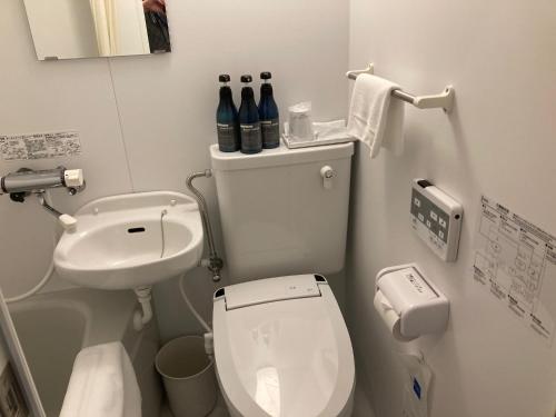 A bathroom at Business hotel ARM Futaba