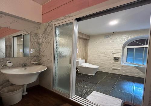 Woomigwan Hotel tesisinde bir banyo