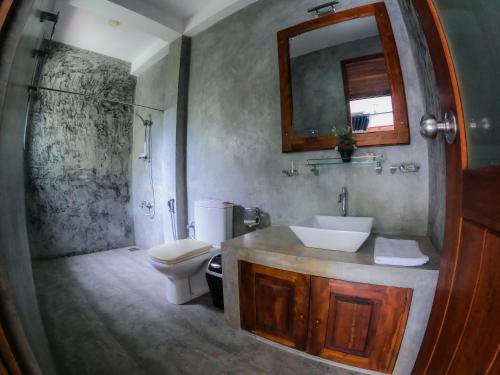 Koupelna v ubytování Hotel Athgira
