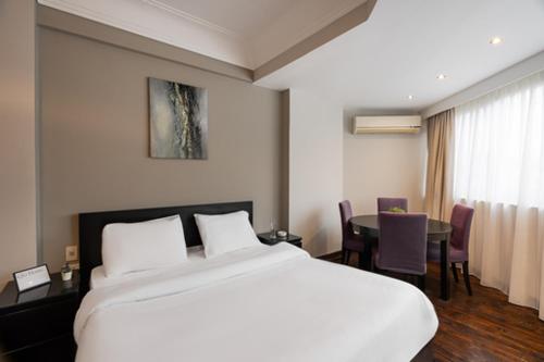 Lova arba lovos apgyvendinimo įstaigoje Zamalek Serviced Apartments by Brassbell