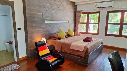 Ένα ή περισσότερα κρεβάτια σε δωμάτιο στο Alpha Gay Resort & Spa - Men Only