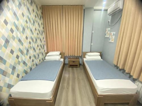 Inter Hotel Bishkekにあるベッド