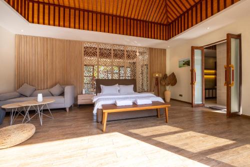 Postel nebo postele na pokoji v ubytování Ream YoHo Resort
