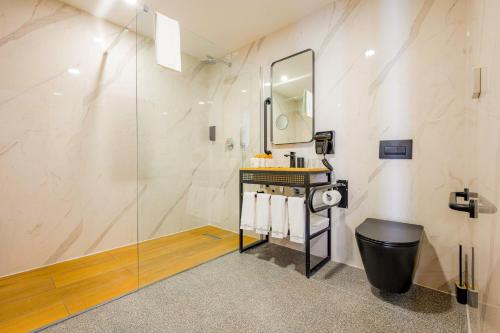 Koupelna v ubytování Grands Suites Hotel Residences and Spa