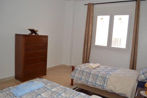 Posteľ alebo postele v izbe v ubytovaní Appartement à Guembetta avec vue panoramique