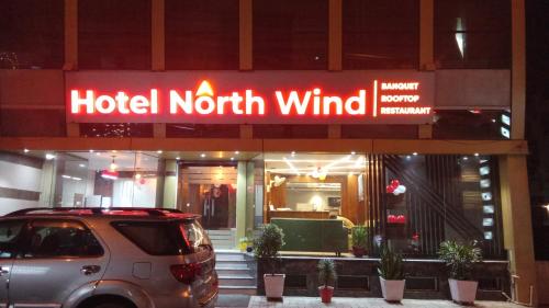 a car parked in front of a hotel north wind at Hotel Northwind Mohali in Mohali