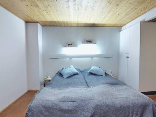 Un pat sau paturi într-o cameră la Borealis