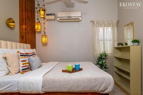Katil atau katil-katil dalam bilik di EKOSTAY - Copacabana Villa