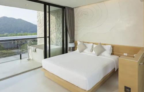 En eller flere senger på et rom på Botanica Khaoyai (Suite, 64 sqm) Mountain View