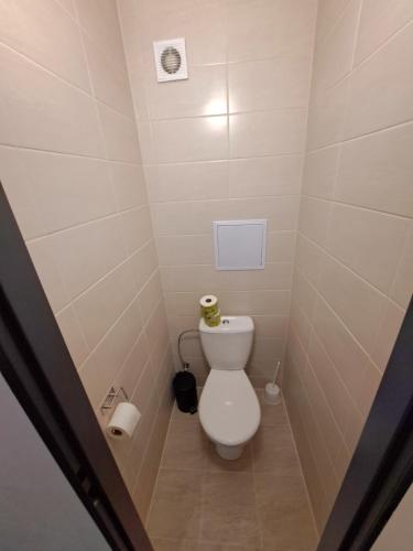 a small bathroom with a toilet in a stall at Školský internát Medická 2 in Košice