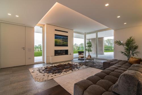 Χώρος καθιστικού στο STIMAHome villa con piscina privata