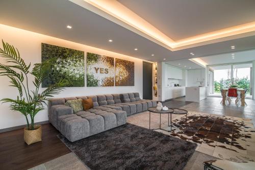 Χώρος καθιστικού στο STIMAHome villa con piscina privata