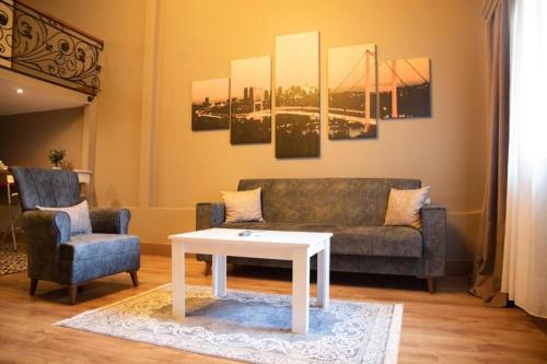 a living room with a couch and a coffee table at The Hera Hotels in Istanbul
