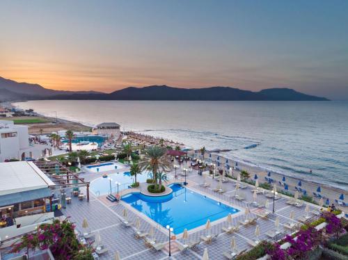 an aerial view of a beach and a resort at Hydramis Palace Beach Resort in Georgioupolis