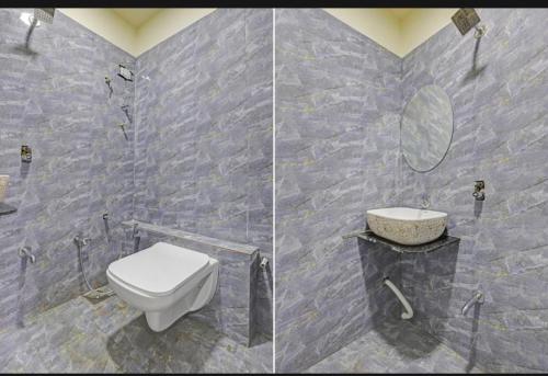 a bathroom with a toilet and a sink at Hotel Rudrax - Anand in Anand