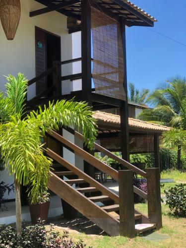 Taman di luar Conchas e Corais Suítes