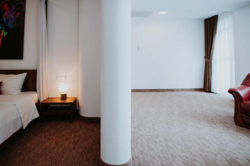 Ένα ή περισσότερα κρεβάτια σε δωμάτιο στο Hotel Select