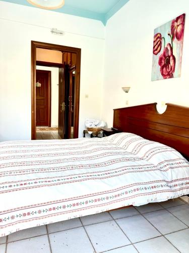 Ένα ή περισσότερα κρεβάτια σε δωμάτιο στο Patras Rooms est 1990