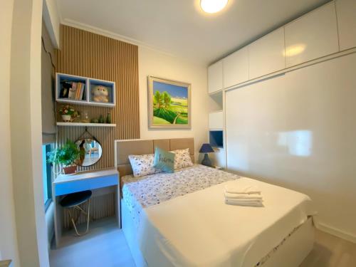 Ένα ή περισσότερα κρεβάτια σε δωμάτιο στο Minh An Homestay