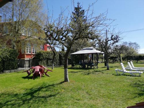 a park with a playground and a gazebo at Willa Wiselka in Wisełka