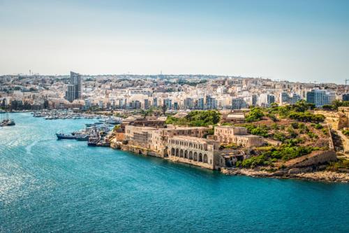 an aerial view of a river in a city at Beautiful 3BR Triplex penthouse with Hot-Tub by 360 Estates in Il-Gżira