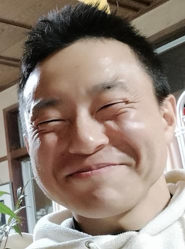 a young man with his eyes closed with his eyes closed at 「けったもん」へようこそ！2階の1室でゆっくり休めます！ in Nagano