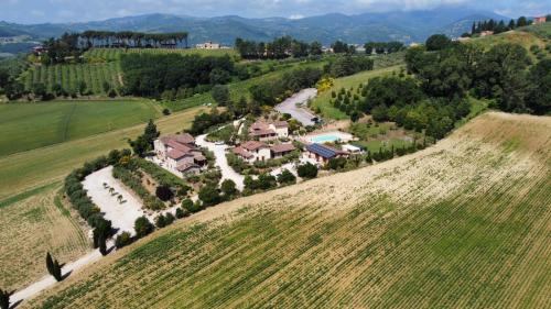 an aerial view of a house on a hill at L'Antico Casale in Perugia