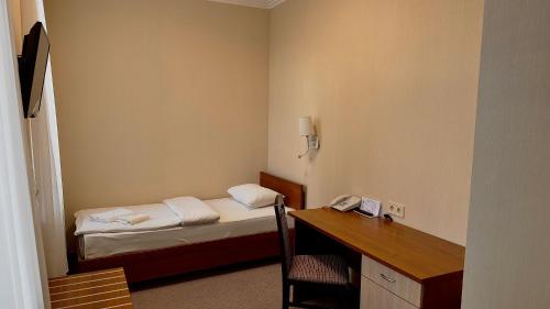 Una cama o camas en una habitación de Civilization